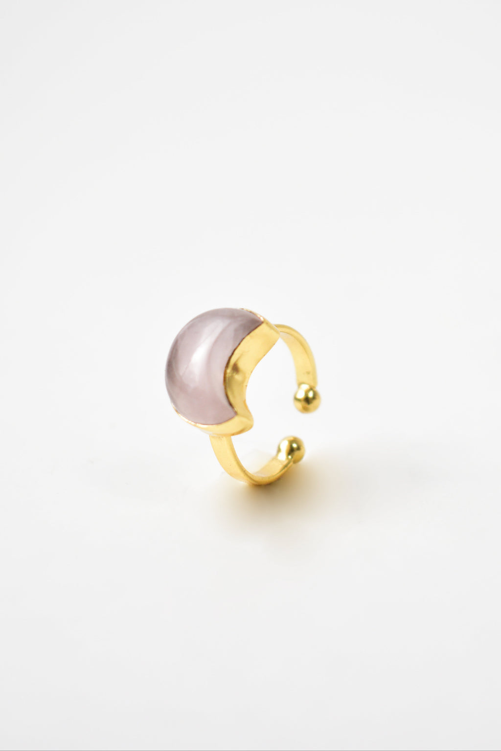 Kokum jewels Gold ring with a pink pearl on a light gray background