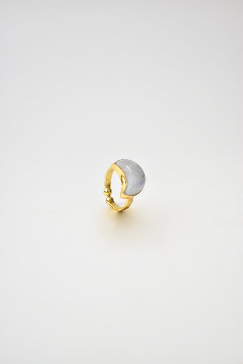 Gold and silver ring on a light gray background Kokum jewels